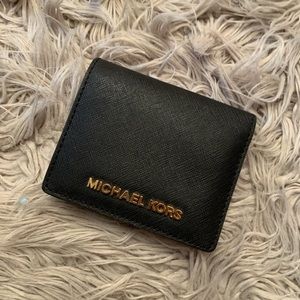 Micheal Kors NYT small flap wallet
